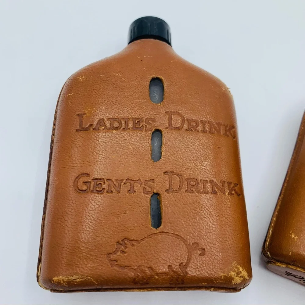 Pair Of Vintage Souvenir Leather Wrapped Glass Whiskey Flasks